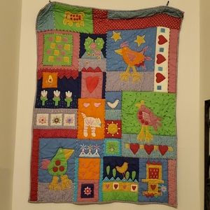 Hand-embroidered quilt